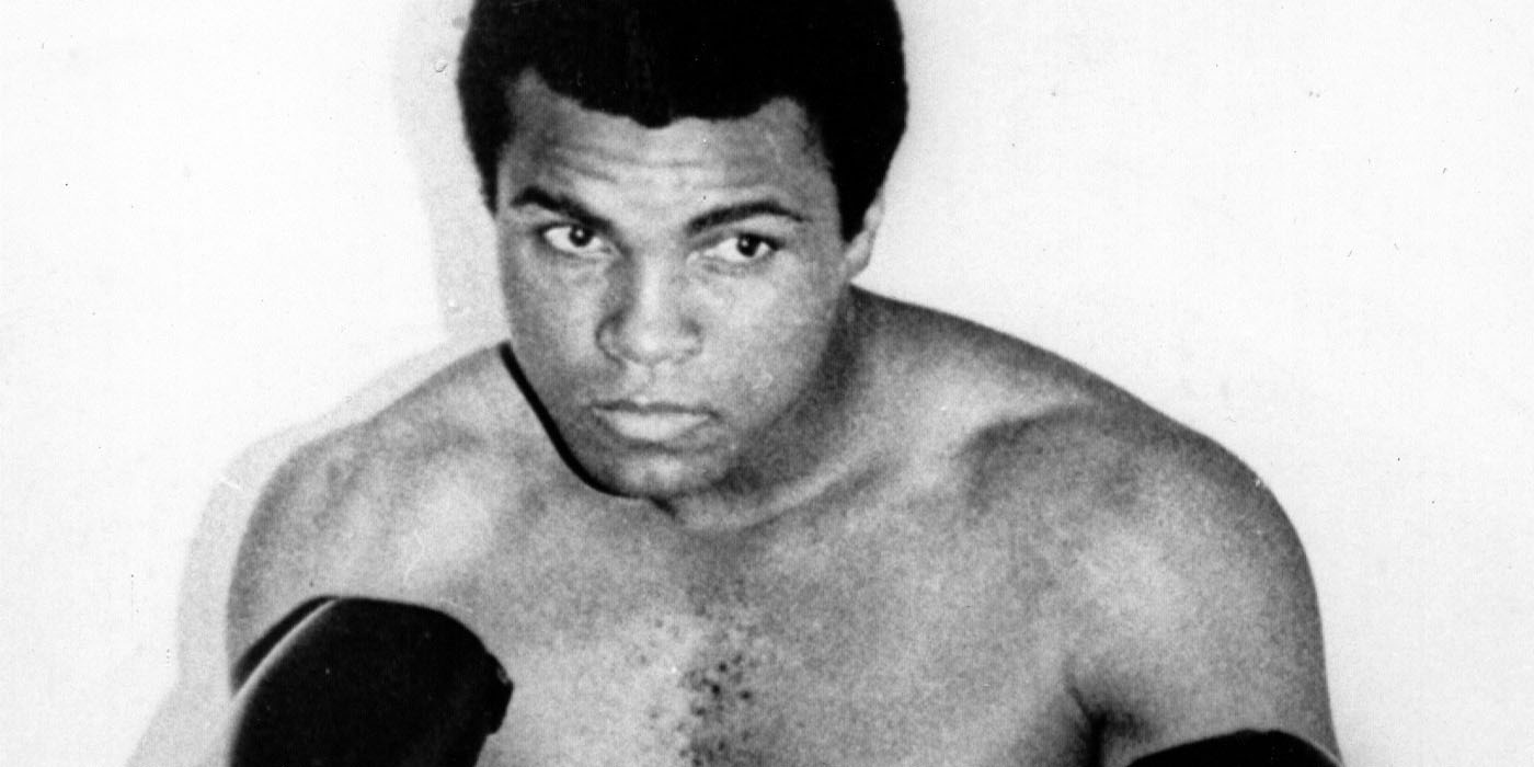 Undated photo (pre-1976) of boxing champion Muhammad Ali (Cassius Clay) in boxing outfit.!''